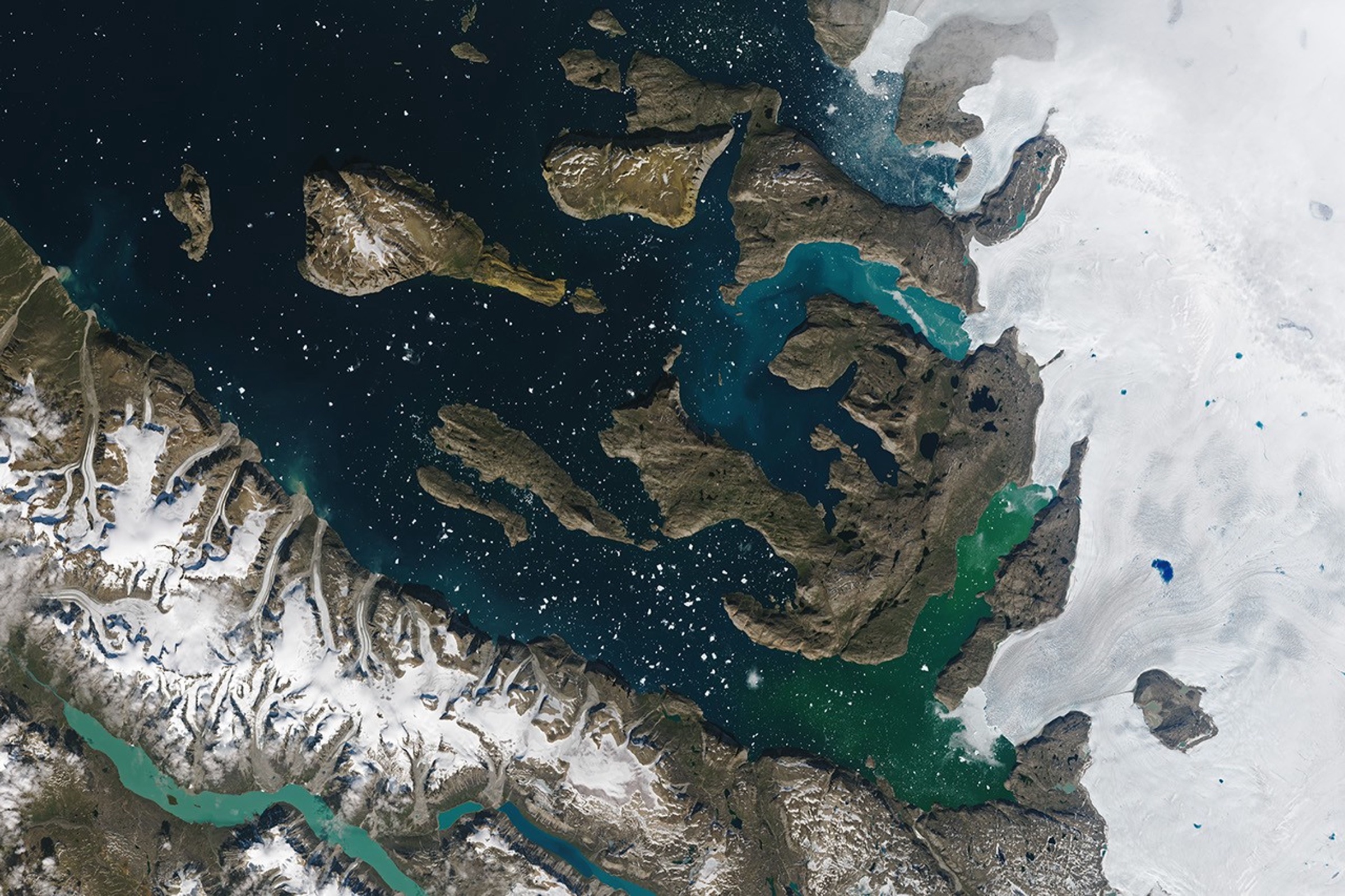 Landsat satellite view of the islands, fjords and ice of western Greenland